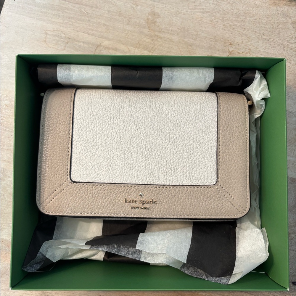 Kate Spade Tan and White Clutch with Sophisticated Design